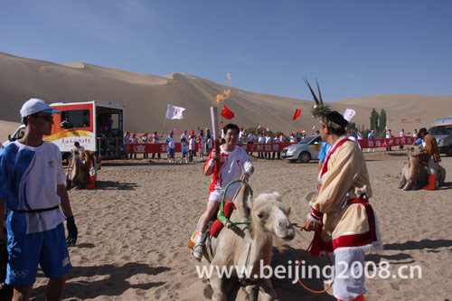 Photos: Sacred flame relayed via camel
