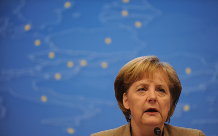 German Chancellor Angela Merkel addresses a press conference held after the close of the two-day European Union spring summit in Brussels, capital of Belgium, March 20, 2009. [Xinhua]