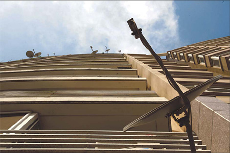 Satellite dishes installed illegally by homeowners are common at the Yuanyang Tiandi community. 