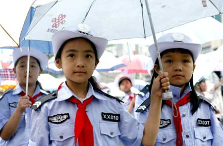 A group of young traffic ambassadors are about to be appointed in Huashi, Sichuan Province Wednesday, where they will promote road safety. Forty primary school students were approved. Photo: CFP