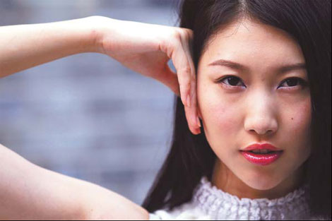 Top model Zhao Chenchi says strict training contributes to her glittering career.