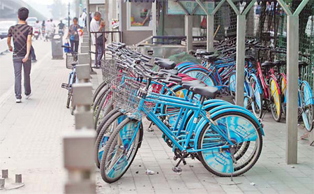 A bicycle rental point near Lama Temple in Beijing. Officials in the capital plan to promote such services and, by 2012, it is expected there will be 1,000 rental stations offering 20,000 bicycles. 