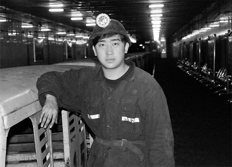 Wang Gang, 24, has followed in the footsteps of his father and grandfather to become a miner in Huairen, a county with dozens of coal mines in coal-rich Shanxi province. 