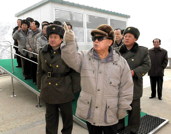 In this photo released on Thursday, DPRK leader Kim Jong-il inspects a power station under construction in the northern city of Huichon. Kim has recently called for a 'great offensive' to boost the country's infrastructure. [Photo/Xinhua]