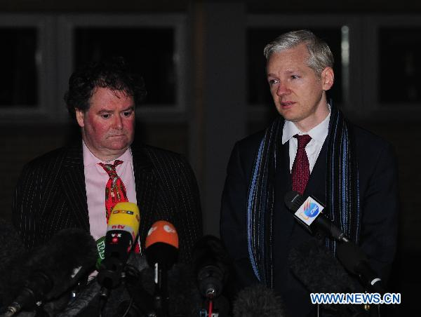 Julian Assange (R), founder of the website Wikileaks, addresses the press with his lawyer Mark Stephens after the final hearing about whether he will be extradited to Sweden, at the Belmarsh Magistrates' Court in southeastern London, Britain, Feb. 8, 2011. The judge didn't come to a decision after the two-day hearing and one extra session will be held on Feb. 11.