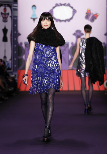 A model presents a creation from the Anna Sui Fall/Winter 2011 collection during New York Fashion Week February 16, 2011.