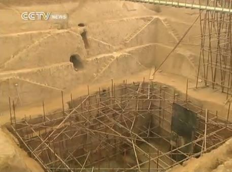Archeologists in northwest China's Shaanxi Province are about to open an ancient tomb dating back some two-thousand years in the southern suburb of Xi'an, capital of Shaanxi. 