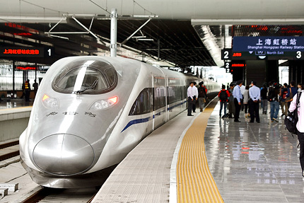 A CRH 380A bullet train arrives at Shanghai Hongqiao Railway Station yesterday. The CRH 380A, taking part in full-route tests of the Shanghai-Beijing high-speed railway, is the world's fastest train, with a top speed of 468 kilometers per hour. When the service begins next month, the train will pull 16 carriages and have a passenger capacity of 1,004. 