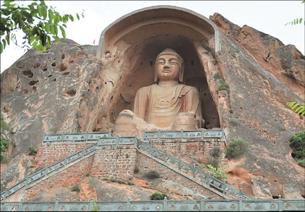 The most celebrated place of interest on Mt Xumi in Guyuan City is the Giant Sitting Buddha Maitreya in Grotto No. 2, measuring 26 meters in height. [Photo source: Shanghai Daily] 