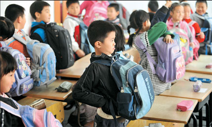 Pupils at a Beijing primary school learn how their mothers experienced during the 10- month pregnancy in a sex education class.