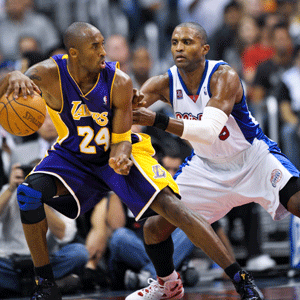 Kobe Bryant of Lakers controls the ball during the NBA basketball game against Clippers of Los Angeles at Staples Center, Los Angeles, the U.S.A., Oct. 29, 2008. Lakers won 117-79.