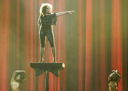 U.S. singer Tina Turner arrives on a hydraulic platform for the start of her European Tour 2009 in Cologne January 14, 2009.