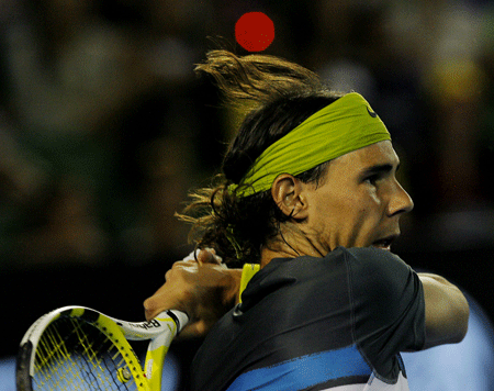 Spain's Rafael Nadal returns to Belgium's Christophe Rochus during first round of the men's singles match at the Australian Open tennis tournament in Melbourne Jan. 20, 2009. Nadal won 3-0 and advanced to the next round.