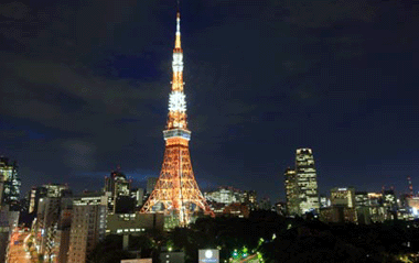 The Tokyo tower decorated with lights of white lamps is seen in Tokyo, capital of Japan, in the photo taken on July 7, 2009. From July 7, Tokyo tower were decked with 180 white energy-saving lamps instead of some of the traditional yellow lamps to illuminate the tower with more 'summer cool color'.