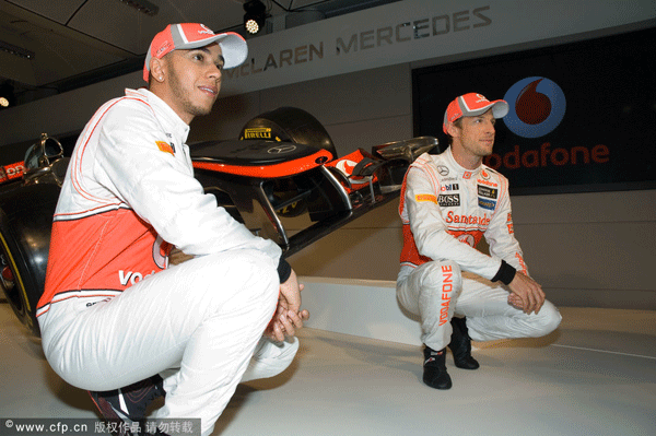 Hamilton and Jenson Button unveil their new car for the 2012 Formula 1 season at the UK McLaren Factory. 