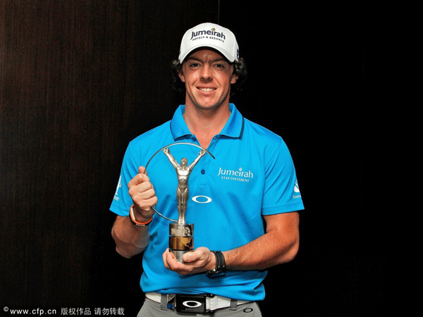 Northern Irish golfer Rory McIlroy posing with his Laureus World Breakthrough of the Year award.