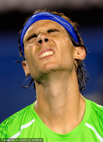  Rafael Nadal of Spain Reacts after losing a point to Novak Djokovic of Serbia during the men's singles final at the Australian Open tennis championship, in Melbourne on Sunday, Jan. 29, 2012.