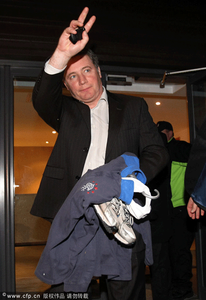 Rangers manager Ally McCoist waves as he leaves Ibrox Stadium, Glagsow.