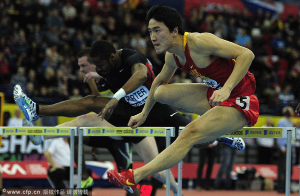 Liu Xiang of China jumps the last hurdle to win the 60 metres hurdle final during the Aviva Grand Pix at the NIA Arena on February 18, 2012 in Birmingham, England.