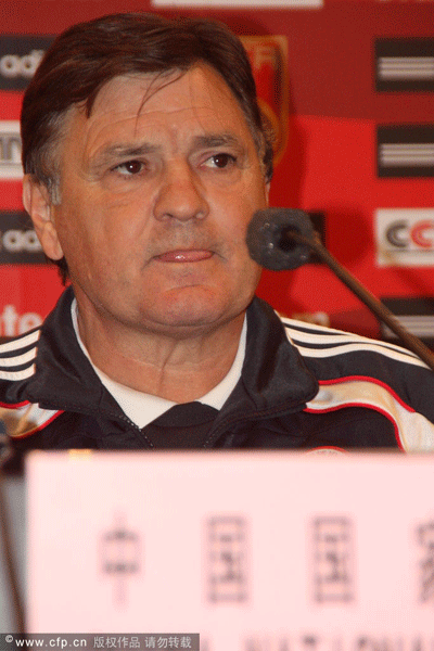 China's head coach Jose Antonio Camacho at a press conference before China's 2014 World Cup qualifying match against Kuwait.