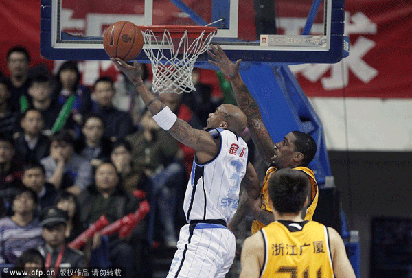 Stephon Marbury of Beijing Ducks goes up for a basket in a CBA playoff game between Beijing and Zhejiang on Feb.26, 2012.