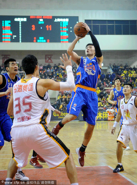 Liu Wei of Shanghai Sharks shoots in front of Ge Zhaoyu of Shanxi in a CBA playoff game between Shanghai and Shanxi on Feb.27, 2012.