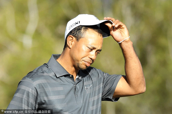  Tiger Woods reacts after losing his match to Nick Watney (not pictured) on the 18th hole during the second round of the World Golf Championships-Accenture Match Play Championship at the Ritz-Carlton Golf Club on February 23, 2012 in Marana, Arizona.