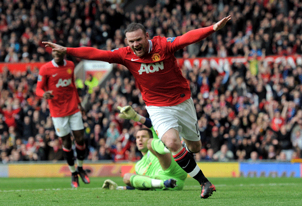 Wayne Rooney of Manchester United celebrated after scoring against West Bromwich in a Premier League match on Mar. 11, 2012.