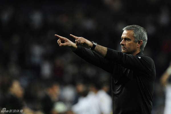 Real Madrid's coach Jose Mourinho from Portugal reacts after a Champions League round of 16, second leg soccer match against CSKA Moscow's at the Santiago Bernabeu Stadium, in Madrid, Wednesday, March 14, 2012.