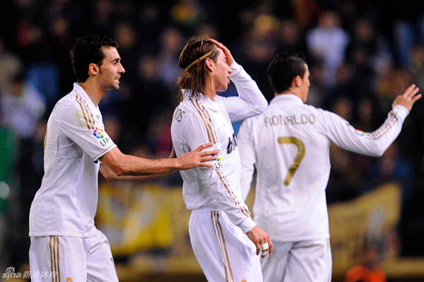 Real Madrid players react after drawing 1-1 with Villarreal during their La Liga soccer match at Madrigal stadium in Villarreal, Spain, Wednesday, March 21, 2012.