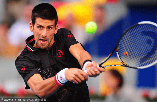 Novak Djokovic of Serbia in action against Daniel Gimeno-Traver of Spain in the 2nd round of the Mutua Madrilena Madrid Open at the Caja Magica on May 8, 2012 in Madrid, Spain.