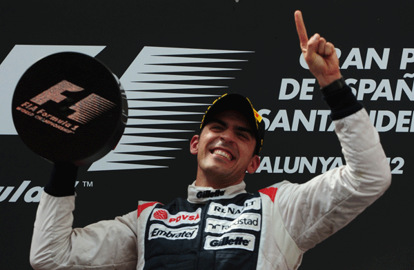 Pastor Maldonado celebrates his win at the Spanish Grand Prix in Barcelona.