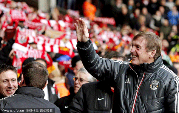 A file picture dated 28 January 2012 shows Liverpool manager Kenny Dalglish (R) waving to supporters prior to the English FA Cup soccer match between Liverpool and Manchester United at Anfield in Liverpool, Britain. 