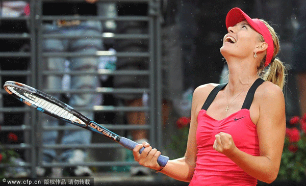 Russian tennis player Maria Sharapova celebrates after winning the final of the Italian Open tennis tournament in the Central Stadium at the Foro Italico in Rome, Italy, on May 20, 2012.