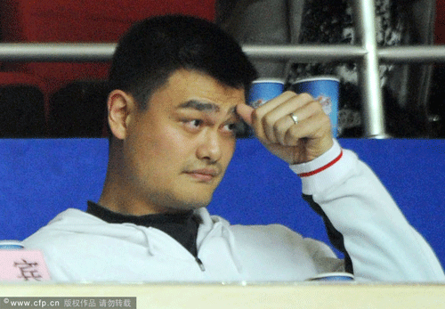Yao Ming watching Shanghai Sharks' game.