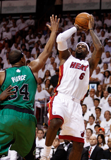 LeBron James shoots in front of Paul Pierce in Game 1 of the NBA Eastern Conference finals.