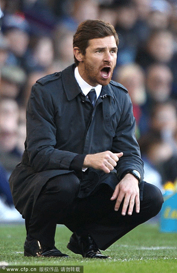 Former Chelsea manager Andre Villas-Boas crouches on the touchline.