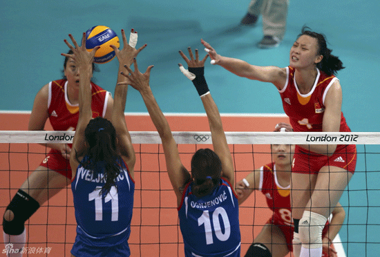 Hui Ruoqi of China spikes the ball.