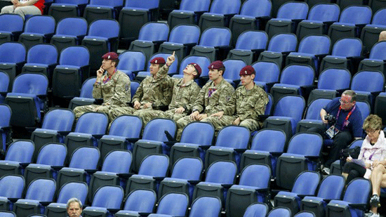 Soldiers take some of the seats at the women's gymnastics.