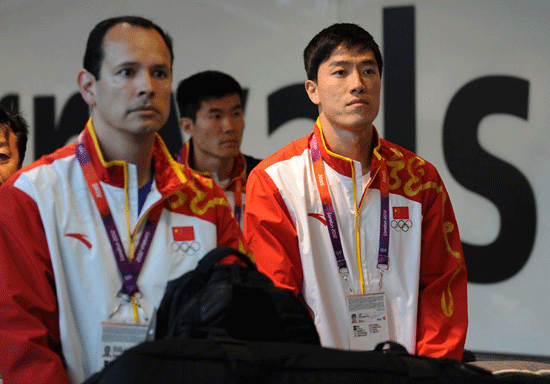 China's 110m hurdler Liu Xiang arrives at Heathrow airport in London, Britain, on August 3, 2012. Liu Xiang will compete in men's 110m hurdles competition of athletics at the London 2012 Olympic Games. [Xinhua]