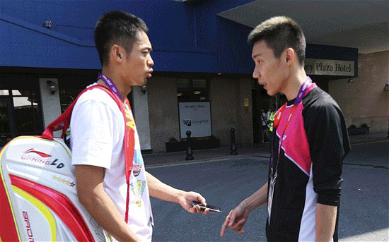 Lin Dan (left) and Lee Chong Wei meet outside Wembley Arena for the start of the Games.