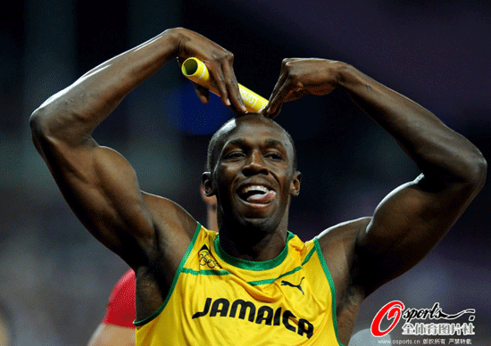Usain Bolt celebrates winning the Men's 4x100m Relay and his third gold medal.