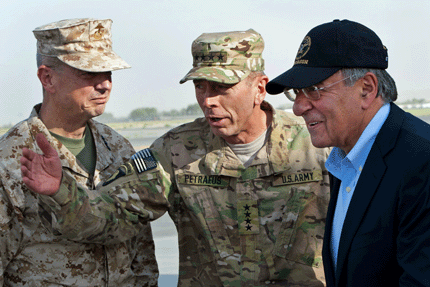 In this July 9, 2011, file photo, General John Allen (left) and Army General David Petraeus (center), the top US commander in Afghanistan and incoming CIA Director at the time, greet Leon Panetta, who had just become US Defense Secretary after working as CIA Director, in Kabul, Afghanistan. 