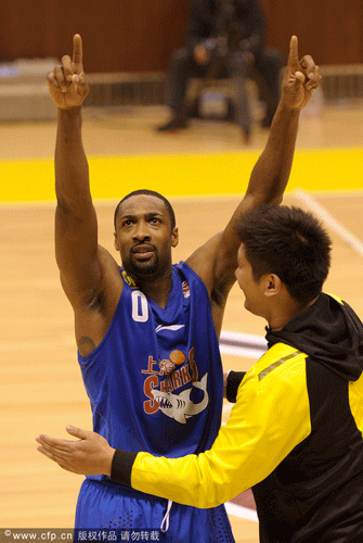 Gilbert Arenas celebrates after making the clutch shot.
