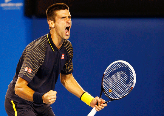 Novak Djokovic celebrates after winning the five-set thriller against Stanislas Wawrinka on Jan.20, 2013.