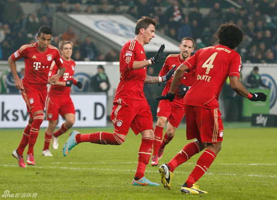 Mandzukic celebrated with teammates after scoring the opener for Bayern Munich in a Bundesliga match against Wolfsburg.
