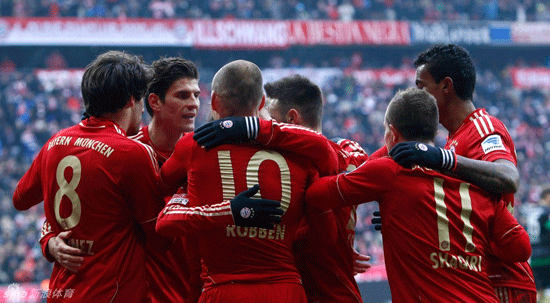 Bayern Munich players celebrate the victory over Bremen in a Bundesliga match.