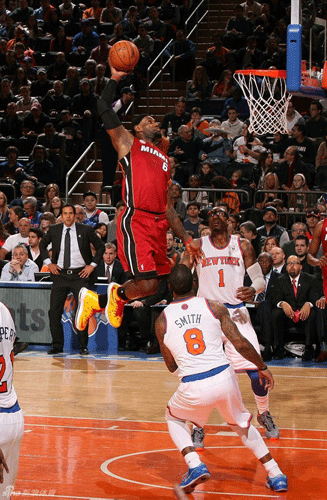 LeBron James goes up for a slam dunk in Miami Heat's win over New York Knicks on March 4, 2013.