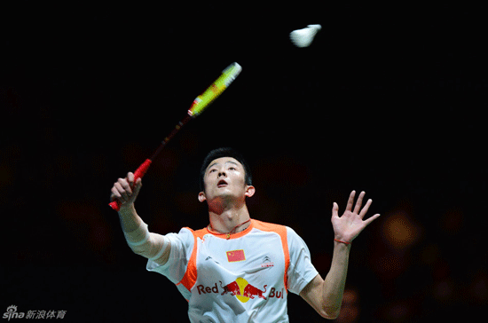 Chen Long of China returns a ball to Malaysia's Lee Chong Wei in All England Open final on March 10, 2013.