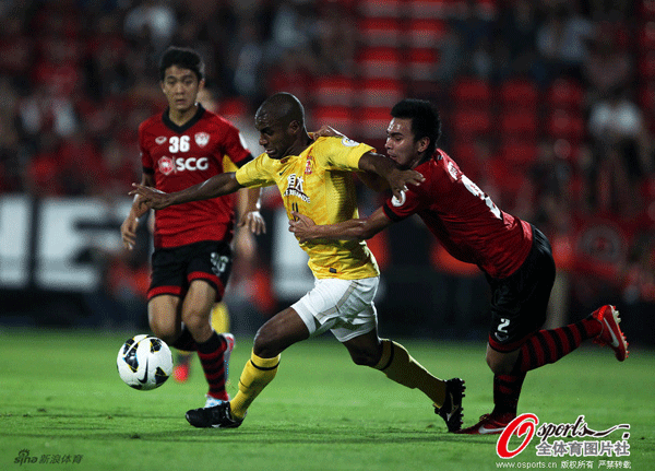  Unstoppable Muriqui scored twice to fire Evergrande to victory.
